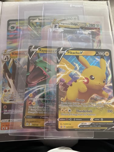 Customer shows several oversized Pokémon cards protected within the clear Semi Rigid Card Holders.