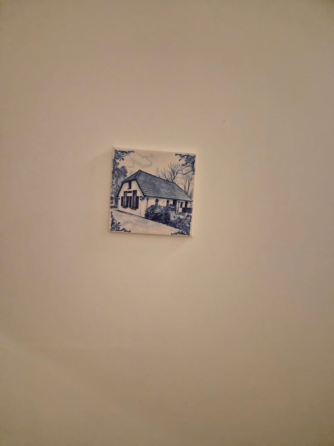 Customer photo review of Delfts Blauw tegeltje bedrukken met eigen huis