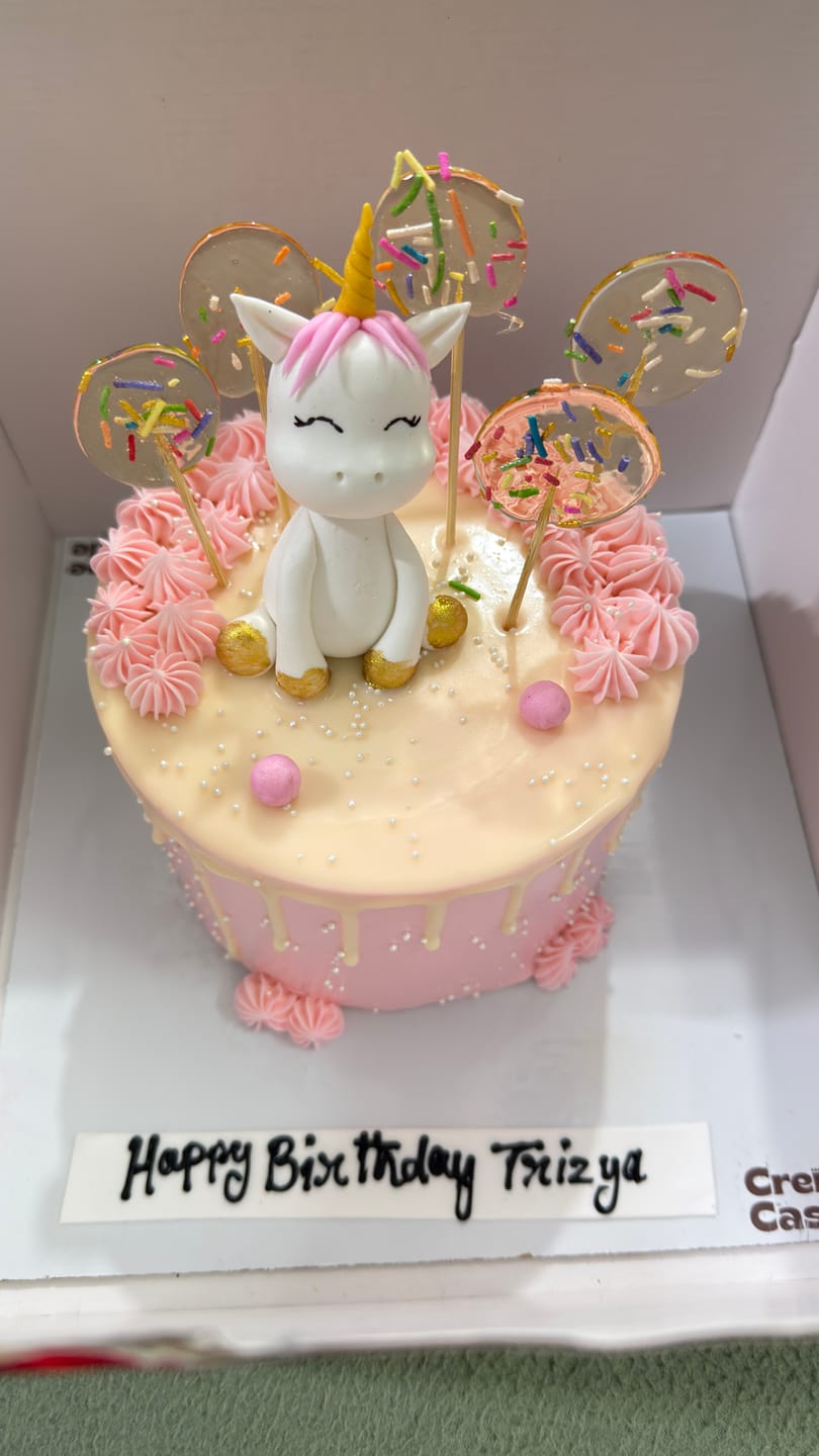 Customer photo review of Unicorn Drip Cream Cake