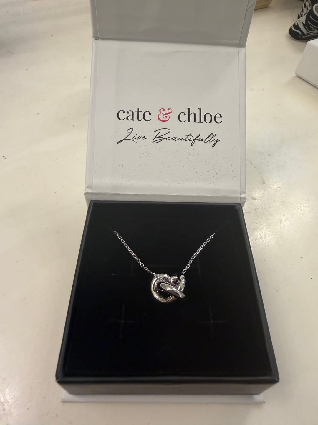 Customer photo review of Ashley 18k White Gold Plated Knot Pendant Necklace