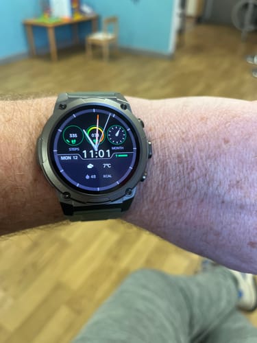 Customer wearing the rugged Gard Pro Ultra 3 smartwatch on their wrist, showing the active digital display.