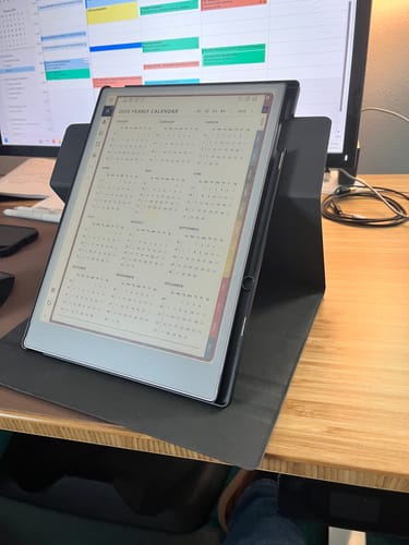 Reviewer's Venture Series folio case used as a convenient stand for a reMarkable Paper Pro on a desk.