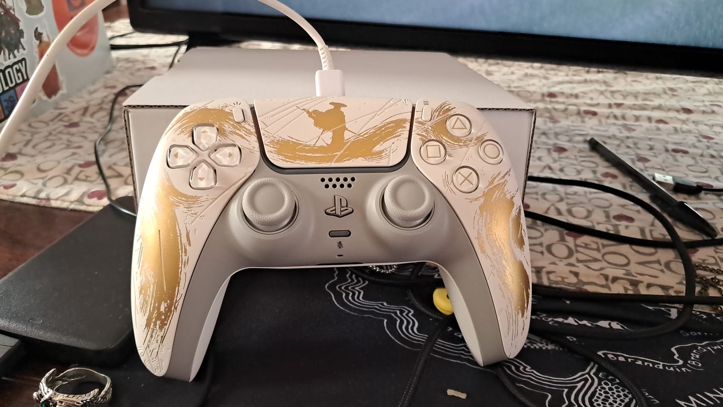 Customer photo review of PlayStation 5 (PS5) DualSense Wireless Controller - Ghost of Yotei Gold Limited Edition