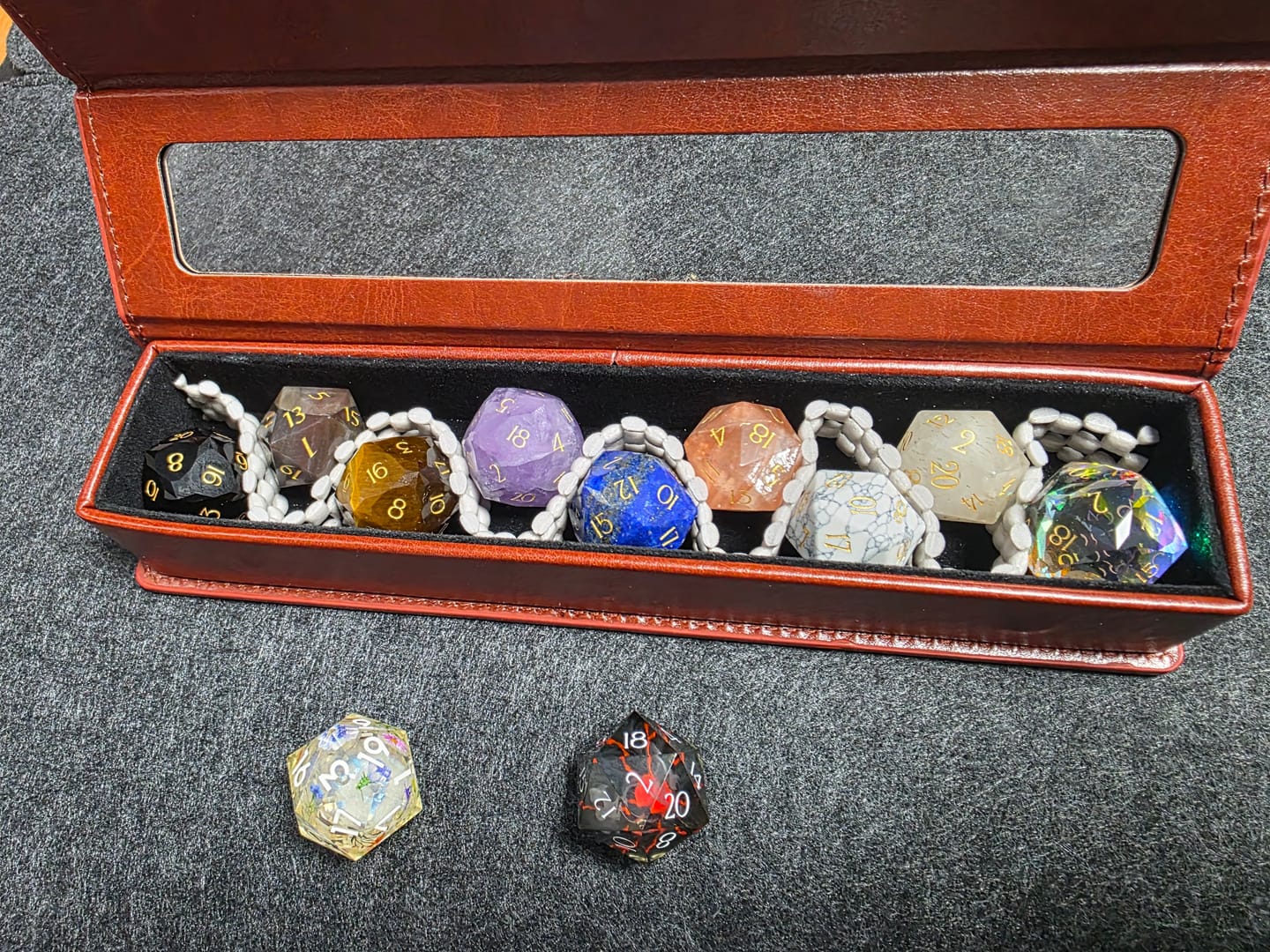 Customer photo review of URWizards D&D Multi-faceted Gemstone Engraved Dice Set