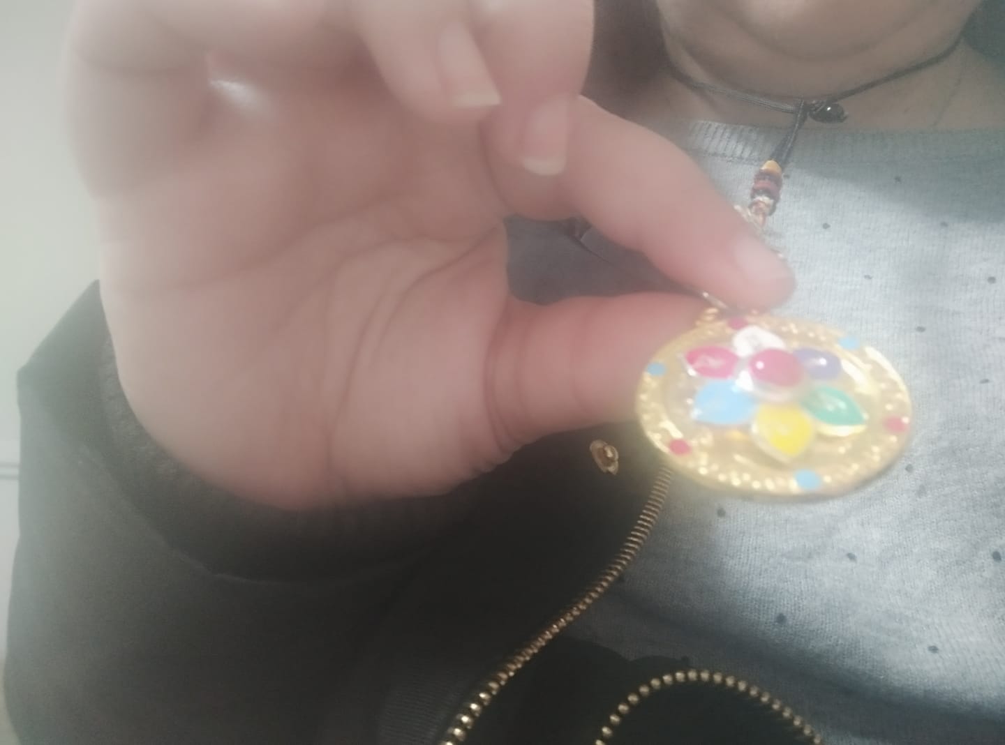 Customer photo review of Amulettes Mani