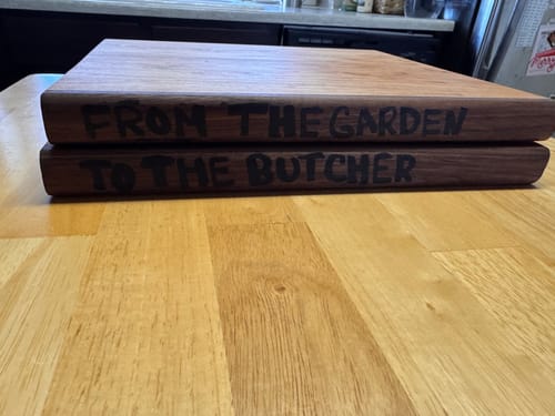 Customer's two wooden cutting boards with 'From the Garden to the Butcher' burned on the sides using the Scorch Marker Pro.