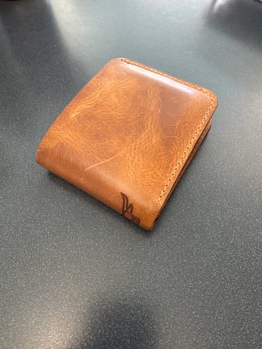 Customer photo review of Badge Bifold Wallet - Saddle Tan