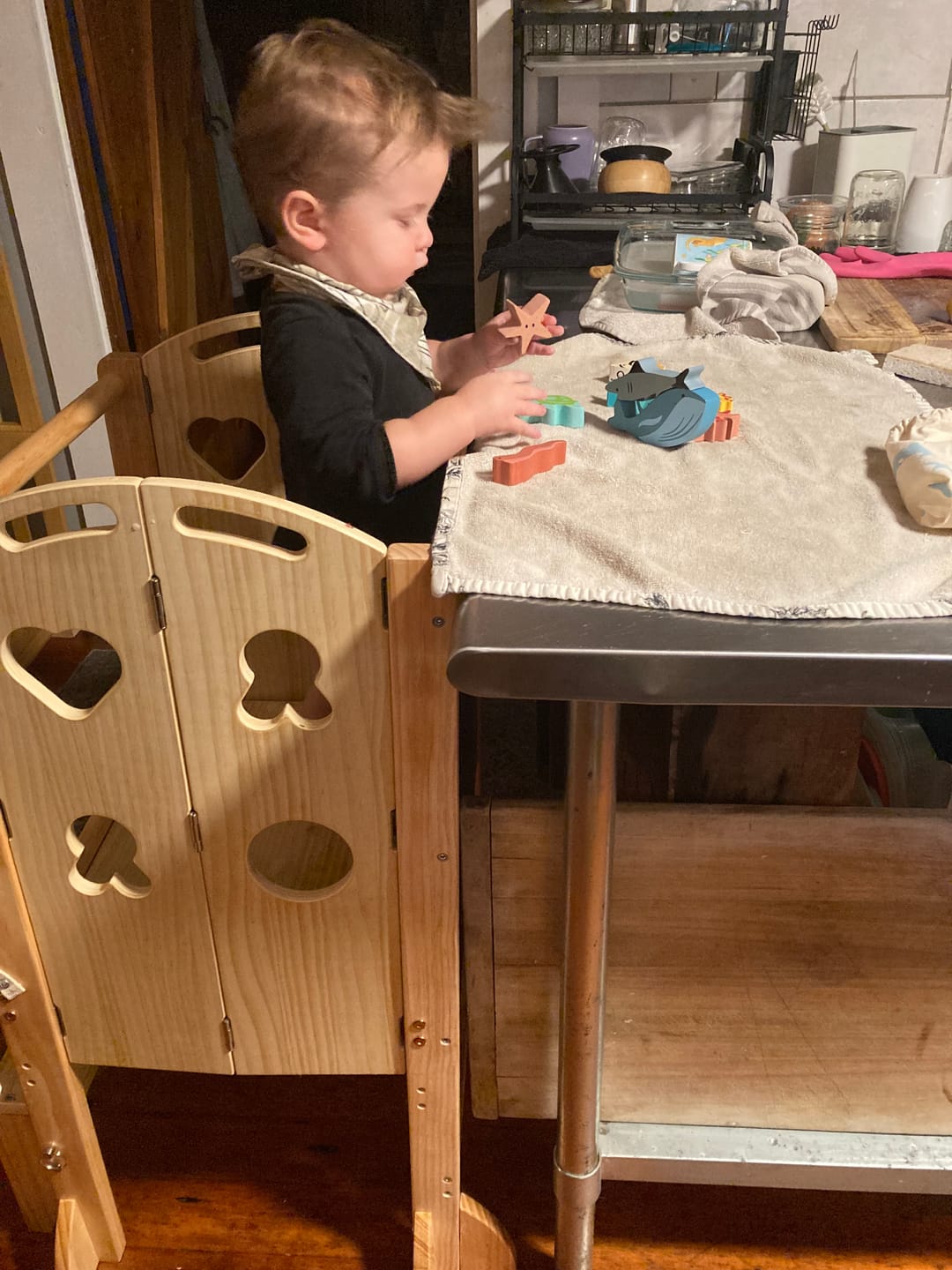 Customer photo review of Plum 3-in-1 Foldable Kitchen Tower, Step Stool & Chalkboard for Toddlers