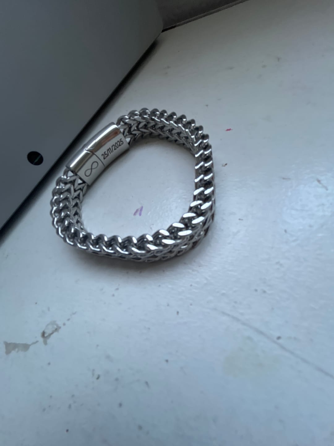 Customer photo review of TitanWeave Custom Engraved Chain Bracelet