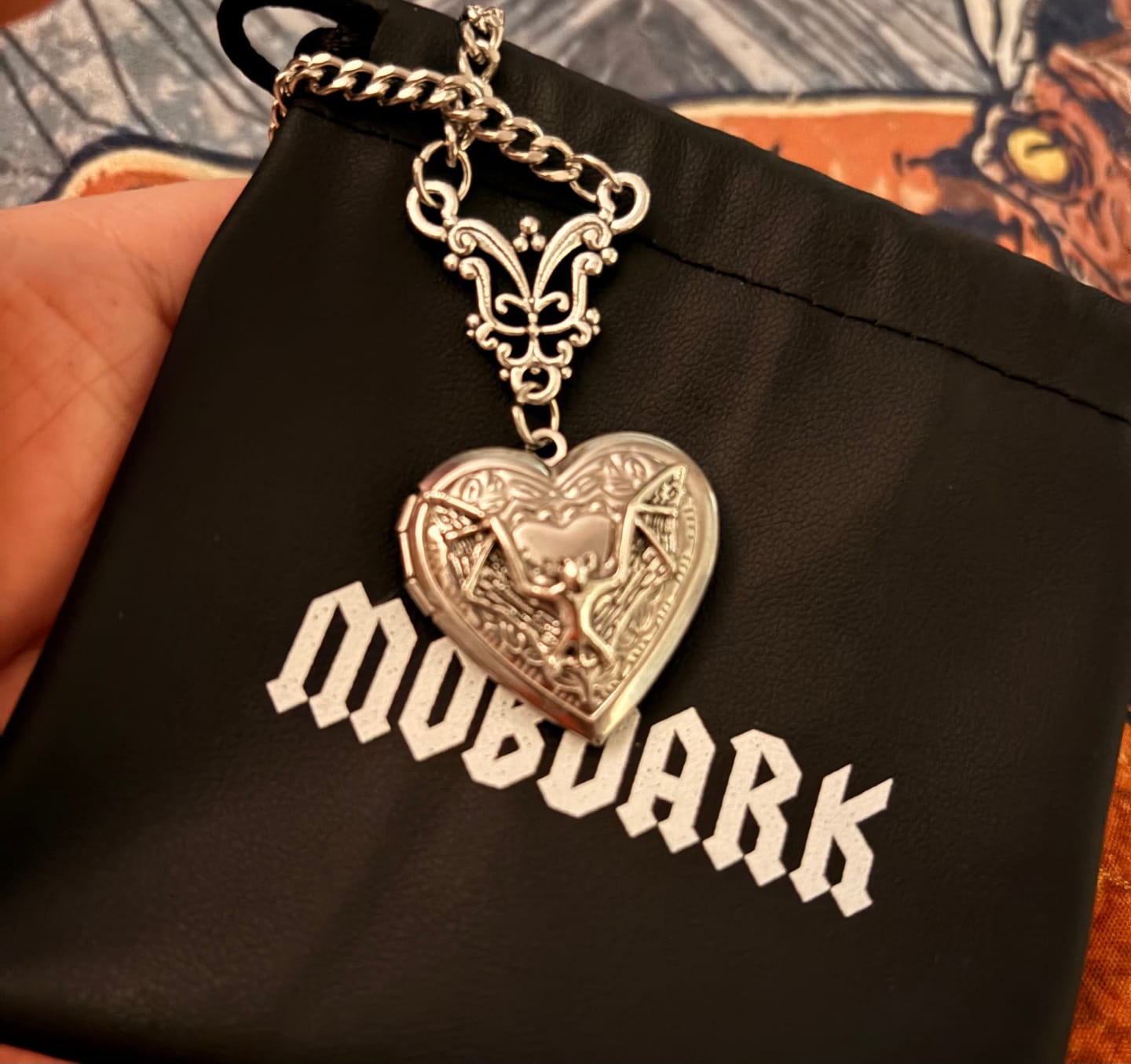 Customer photo review of Bat Locket Necklace