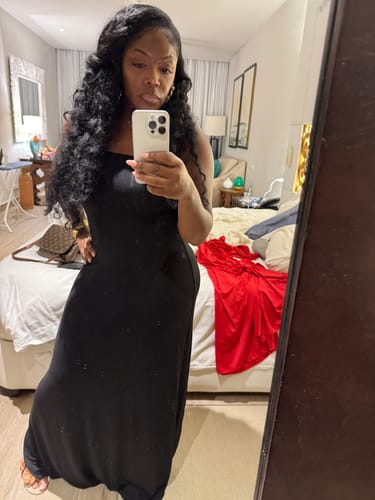 Reviewer taking a mirror selfie in the black Modal Tube A-line Maxi Dress.