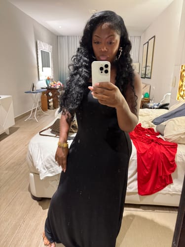 Customer showing another view of the black Modal Tube A-line Maxi Dress.
