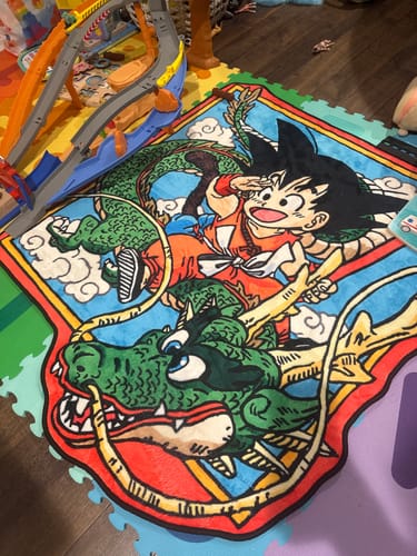 Customer photo review of Dragon Ball Rug – Kid Goku Riding Shenron