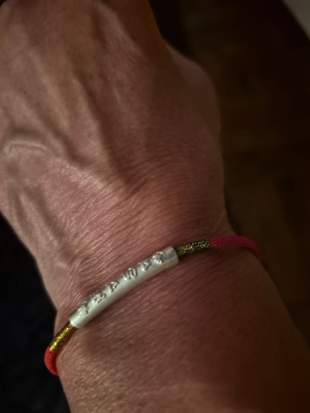 Customer photo review of Buddha Stones Tibetan Buddhist Handmade Mani Mantra Lucky Red String Bracelet