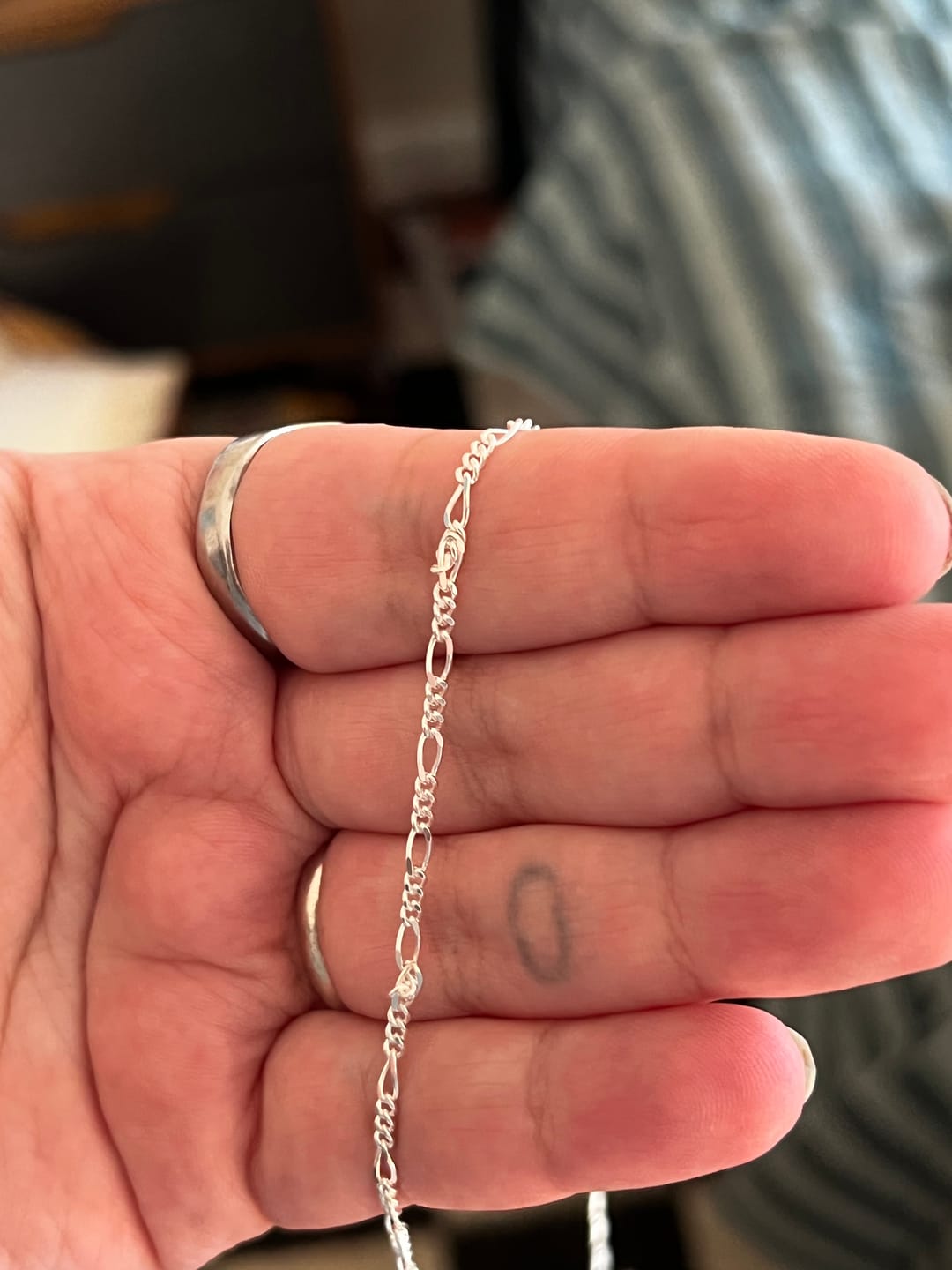 Customer photo review of 2.3MM STERLING SILVER FIGARO CHAIN