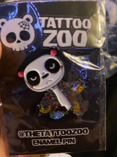 Customer photo review of Kenji the Panda Enamel Pin