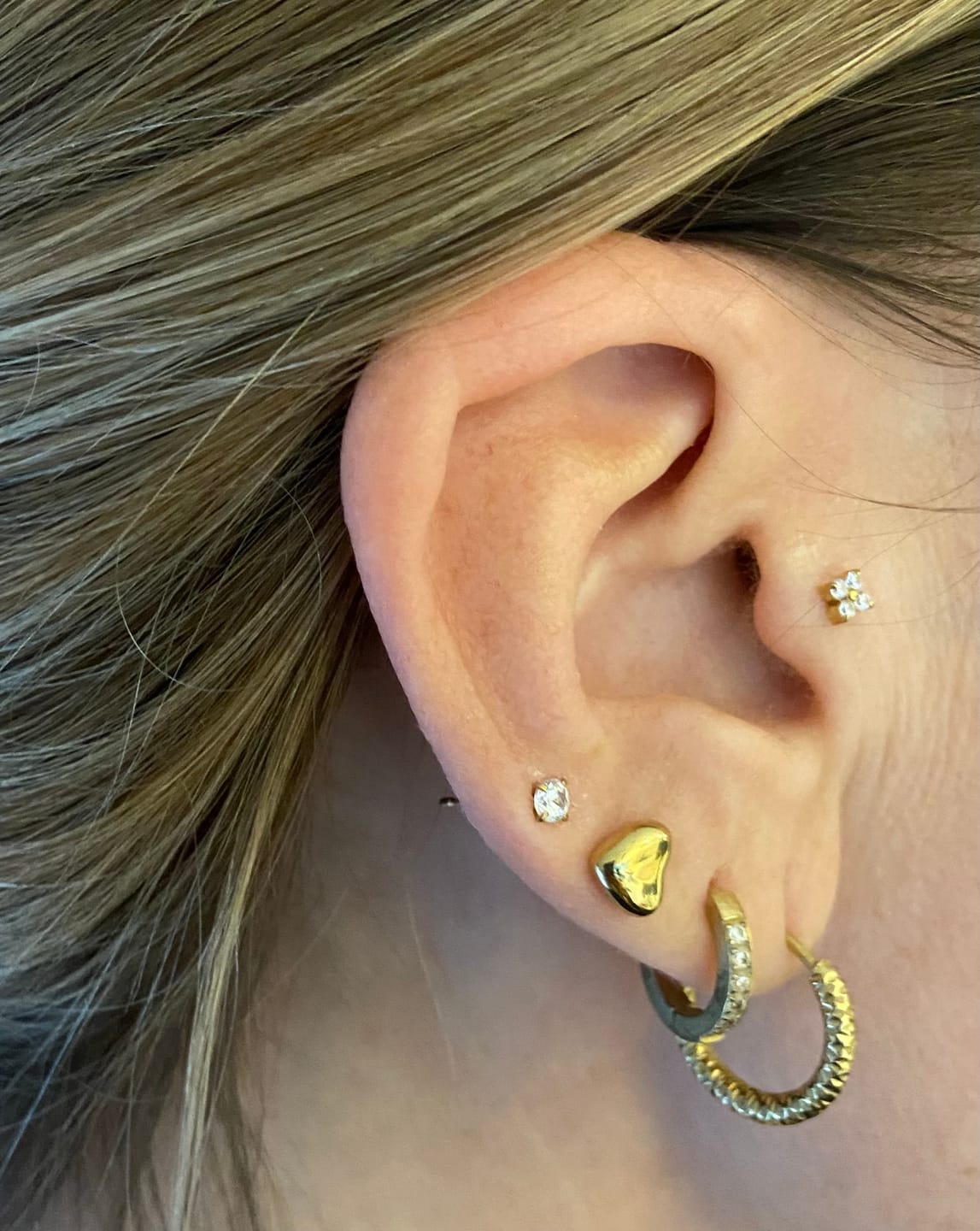 Customer photo review of Cute Four Piercing | Titan