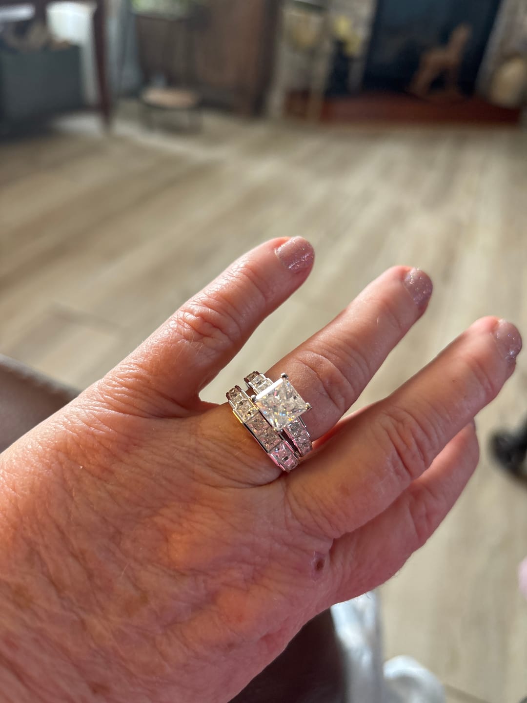 Customer photo review of Princess Cut Moissanite Staircase Channel Set Engagement Ring