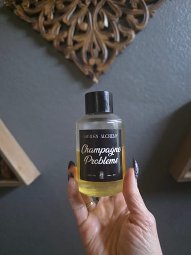 Customer photo review of CHAMPAGNE PROBLEMS BODY OIL