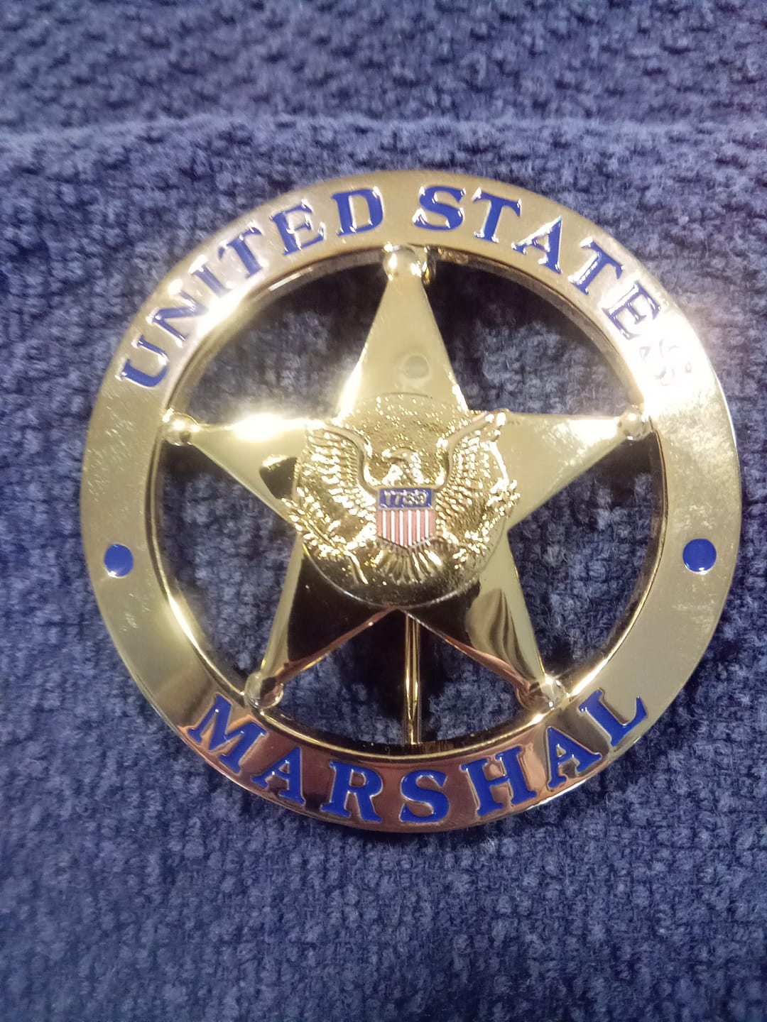 Customer photo review of US Federal Court Law Enforcement Marshal Gold Badge Replica Movie Props