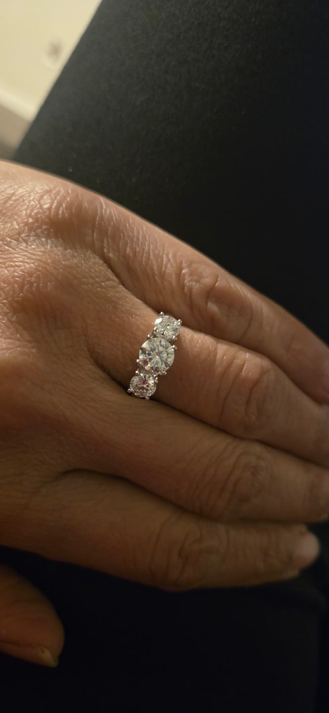 Customer photo review of Classic Three Stone Round Cut Moissanite Engagement Ring