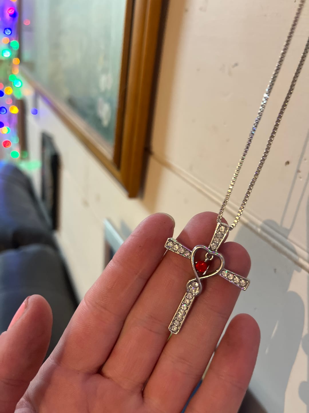Customer photo review of Christianartworkshop 12-Month Birthstone Cross Necklace with Heart Design and Sparkling Accents
