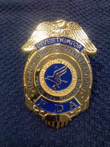Customer photo review of US FDA Investigator Badge Solid Copper Replica Movie Props