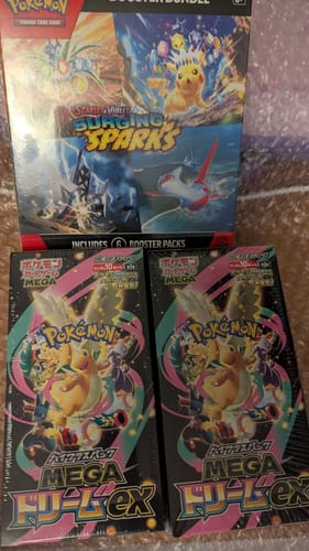 Customer photo review of Pokemon Surging Sparks Booster Bundle