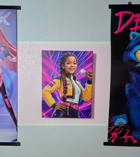 Customer's K-Pop Queen The Magic Beat portrait hanging on a wall between two other posters, as mentioned in the review.