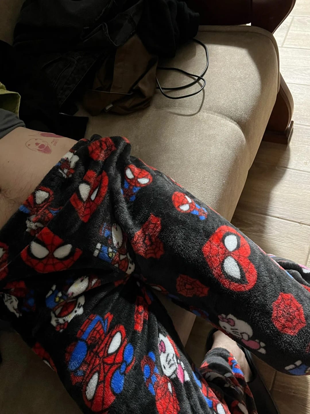 Customer photo review of Black Hello Kitty & Spider‑Man Pajama Pants for Couples