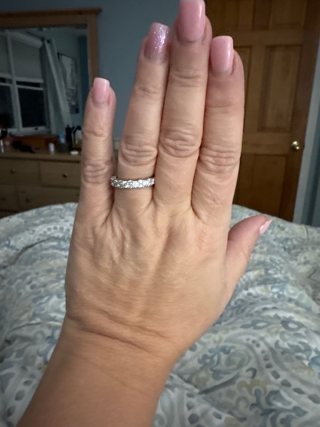 Customer photo review of S925 Moissanite 2.5 Ct Round Cut Full White/Green Stone Wedding Band for Women