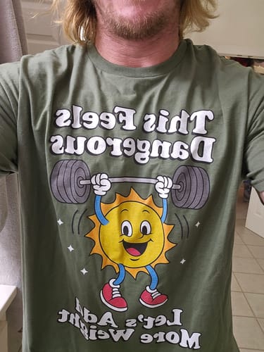 Customer photo review of This Feels Dangerous T-Shirt