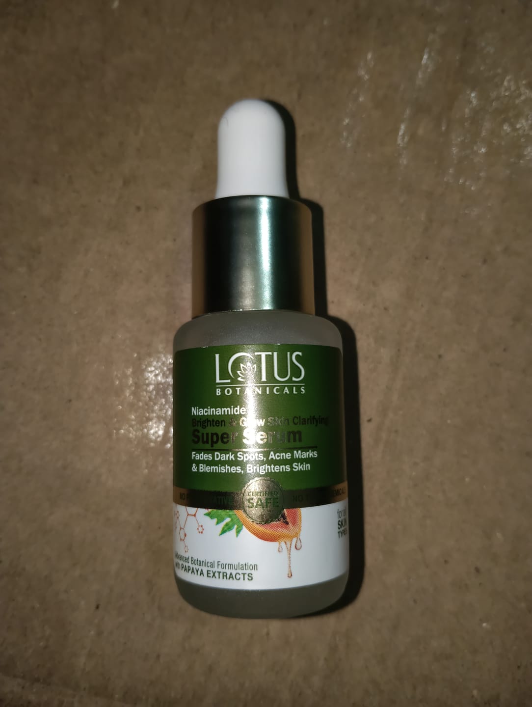 Customer photo review of Papaya & Niacinamide Brighten & Glow Skin Clarifying Super Serum