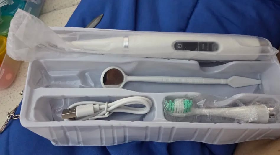 Customer photo review of Détartreur Brosse à dent Électrique 2 en 1