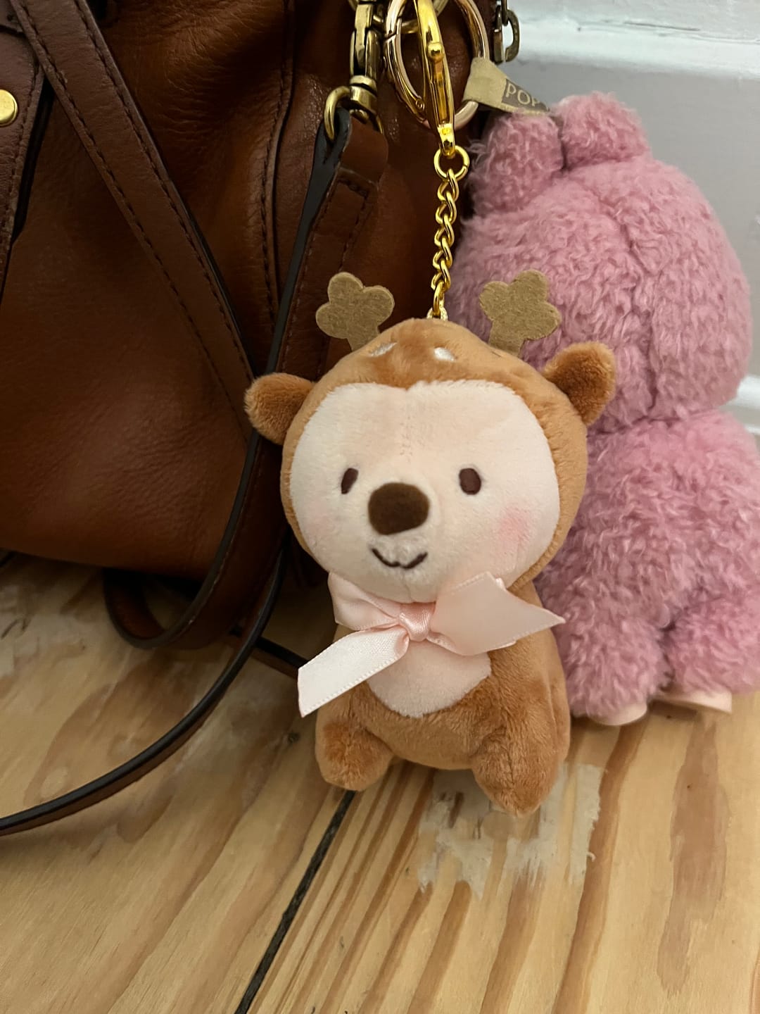 Customer photo review of Cinnamon the Deer Keychain Plush | Kawaii Cottagecore Coquette Plush | Whimsical Pink Bow Deer Plushie | Katnipp Studios