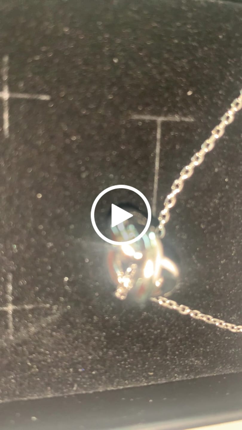 Customer video review of Ashley 18k White Gold Plated Knot Pendant Necklace