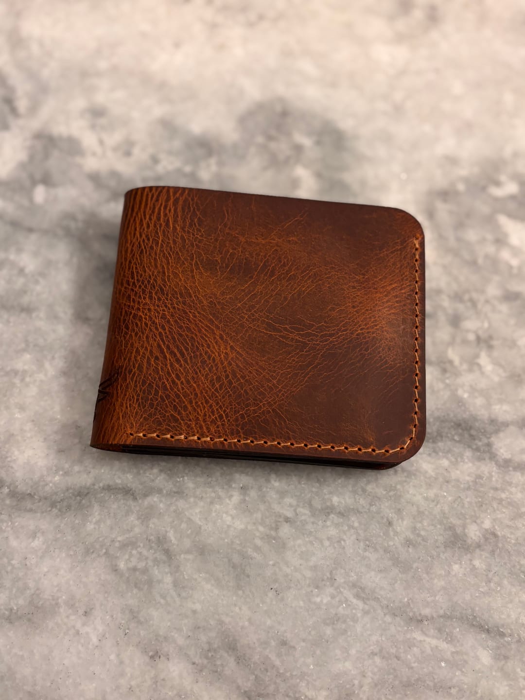 Customer photo review of Badge Bifold Wallet