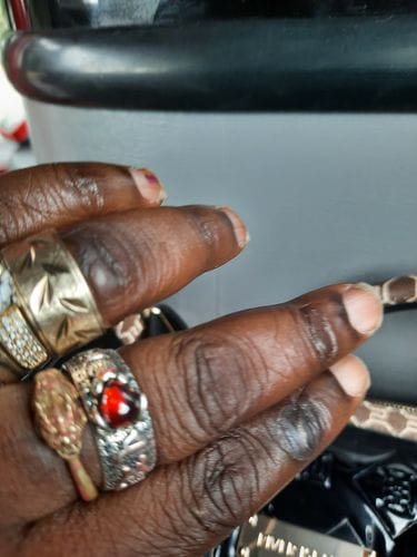 Customer photo review of FuAttract Wealth & Protection Garnet Pixiu Blessing Mantra Ring