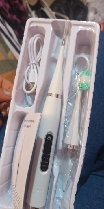 Customer photo review of Détartreur Brosse à dent Électrique 2 en 1