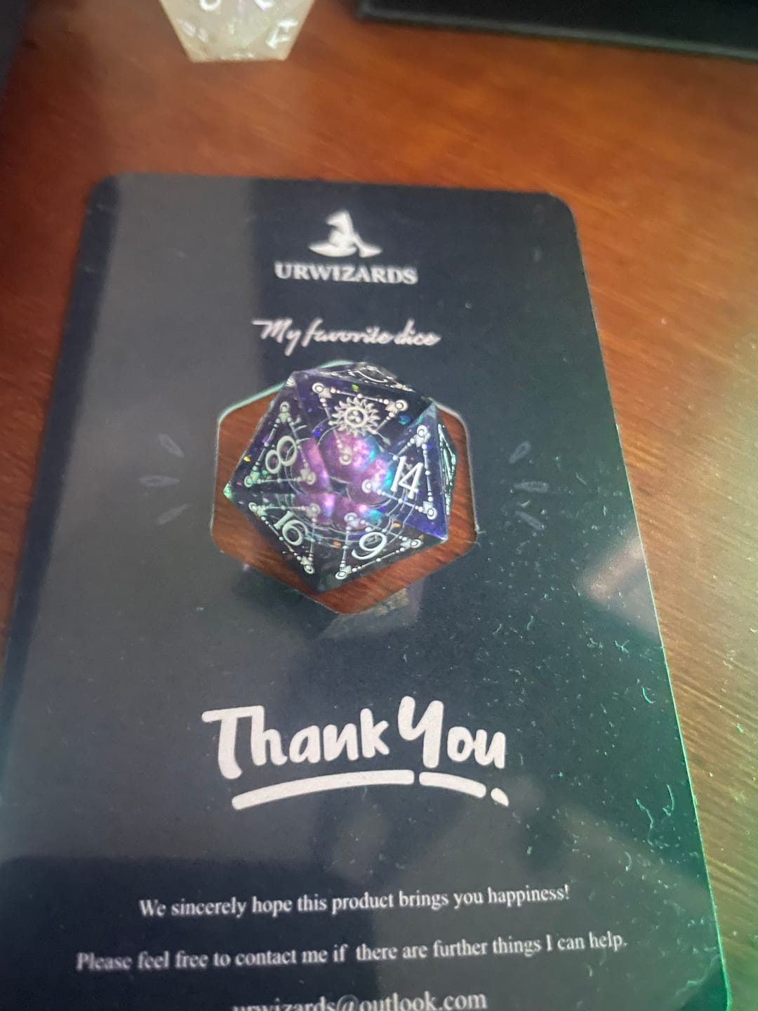 Customer photo review of URWizards D&D The Galaxy Resin Engraved Dice Set Tarot Style