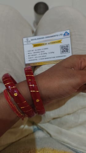 Customer photo review of "Crimson Elegance: A Truly Unique 916 Gold Bangle"