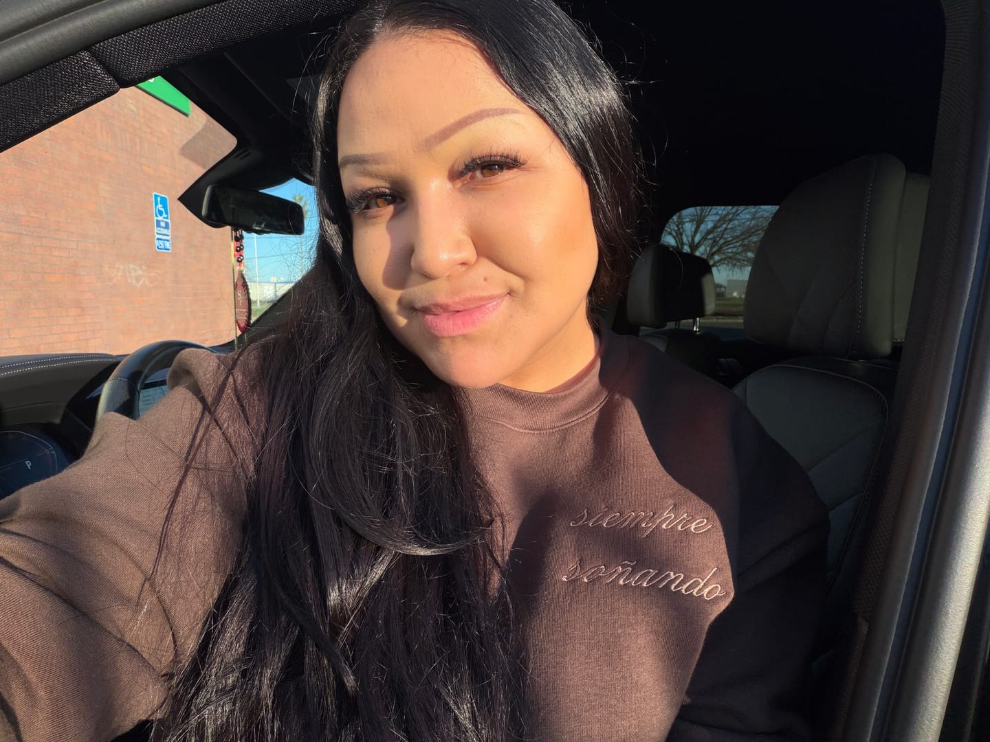 Customer photo review of 'Siempre Soñando' Embroidered Brown Crewneck