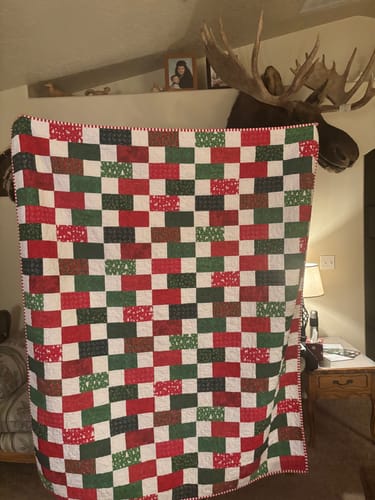 Customer photo review of Brick Merry Christmas Quilt Kit (Backing Available)