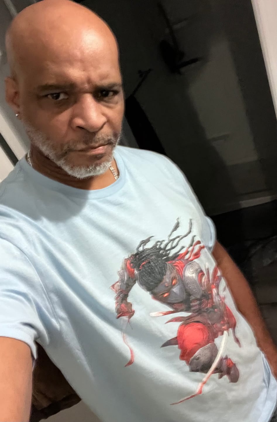 Customer photo review of African Red Moon Assassin Softstyle Tee