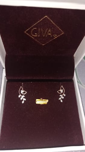Reviewer's Gold Midnight Fleur Lab Grown Diamond Earrings with a leafy design, displayed in the elegant GIVA jewelry box.