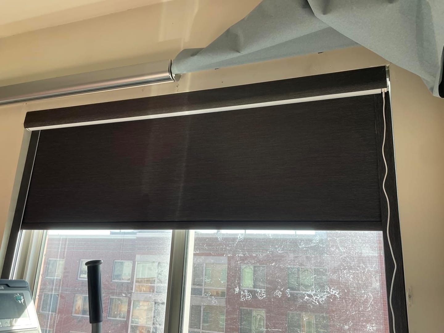 Customer photo review of Bringnox No Drill Motorized Roller Shades 100% Blackout Baltimore
