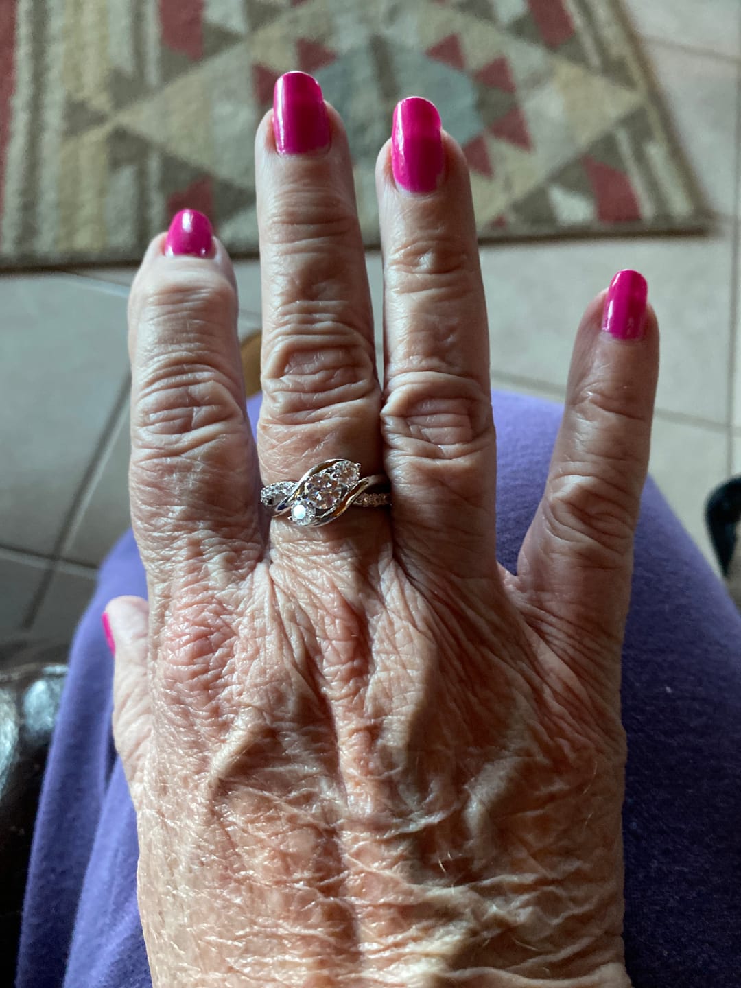 Customer photo review of Swirl Three Stone Moissanite Twisted Pave Engagement Ring