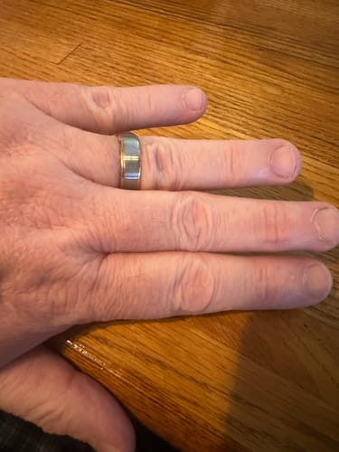 Reviewer showing the result of using the Thorum Ring Sizer: a perfectly fitting ring on their hand.