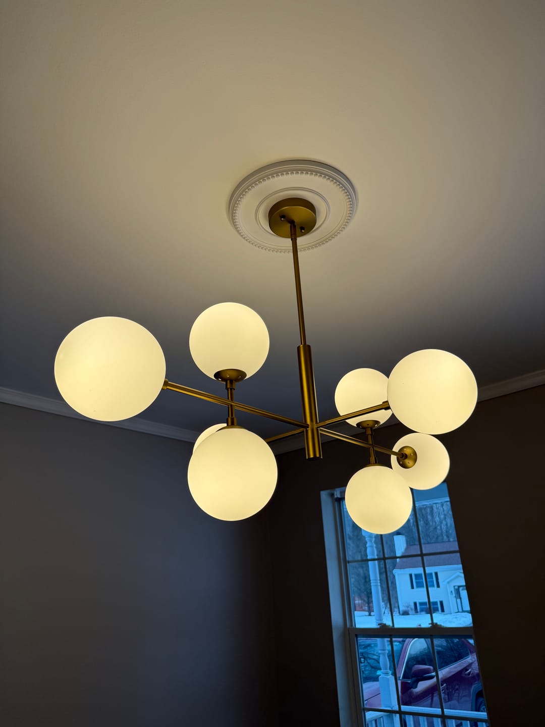 Customer photo review of 8-Light Linear Sputnik Frosted Glass Globe Chandelier