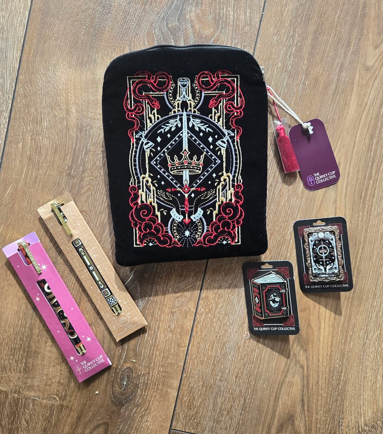 Customer photo review of Dragon Tome Enamel Pin